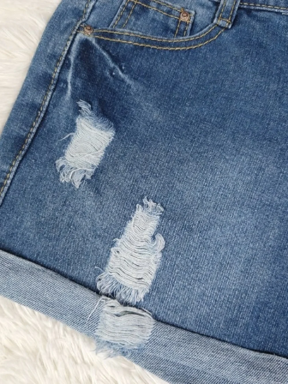 Distressed Blue Denim Shorts with Champion Patch